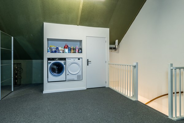 Foto - Te koop: In Landgraaf op een zeer kindvriendelijke locatie bevindt zich deze nette en moderne instapklare energiezuinige tussenwoning uit 2008